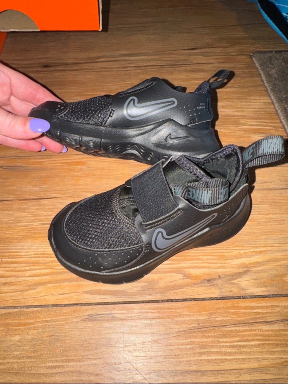 Nike Kids Black Slip-On Sneakers with Gray Swoosh